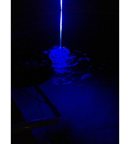 Water Jet Laminar Color LED Light stays inside a stream of water pool pond