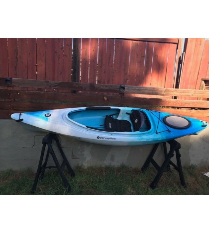Perception sit-inside kayak used with Werner paddle