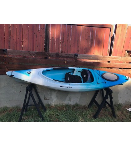 Perception sit-inside kayak used with Werner paddle