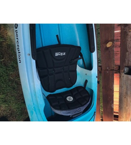 Perception sit-inside kayak used with Werner paddle