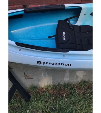 Perception sit-inside kayak used with Werner paddle